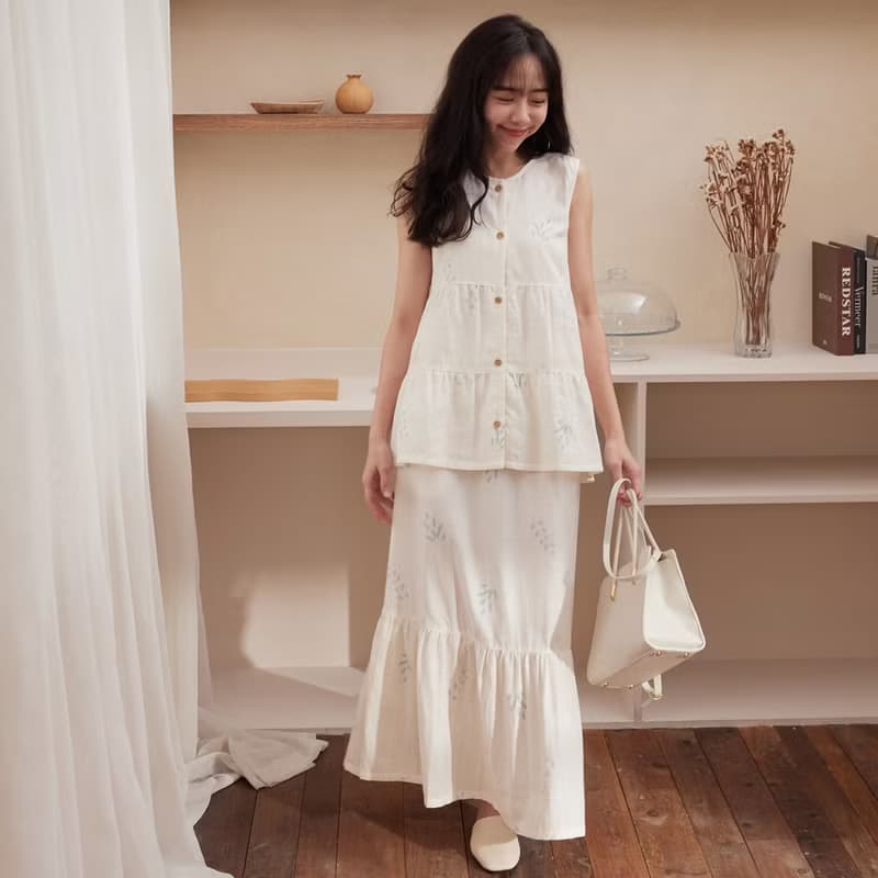 會呼吸∣UMORFIL調溫透氣二重紗水波花卉排釦背心-共2色