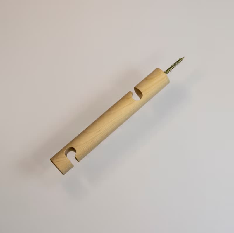 Birch wall bracket for hanging plug-In pendant and plant on wall.