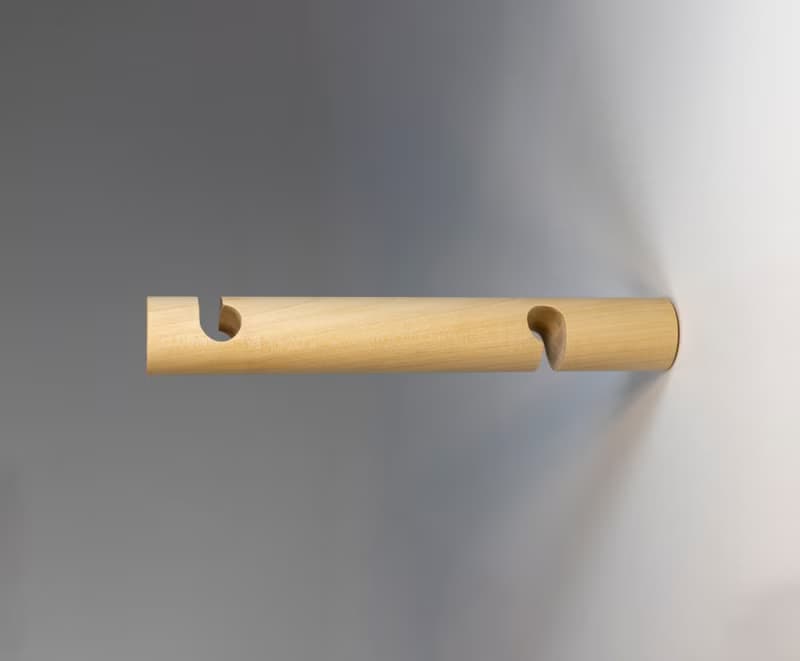 Birch wall bracket for hanging plug-In pendant and plant on wall.