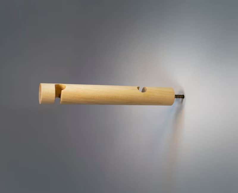 Birch wall bracket for hanging plug-In pendant and plant on wall.