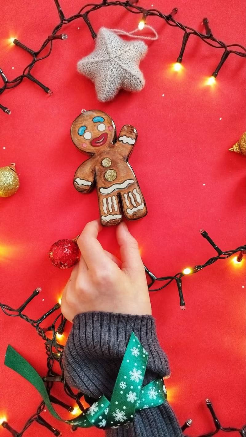 Gingerbread man, a Christmas tree toy made of wood.