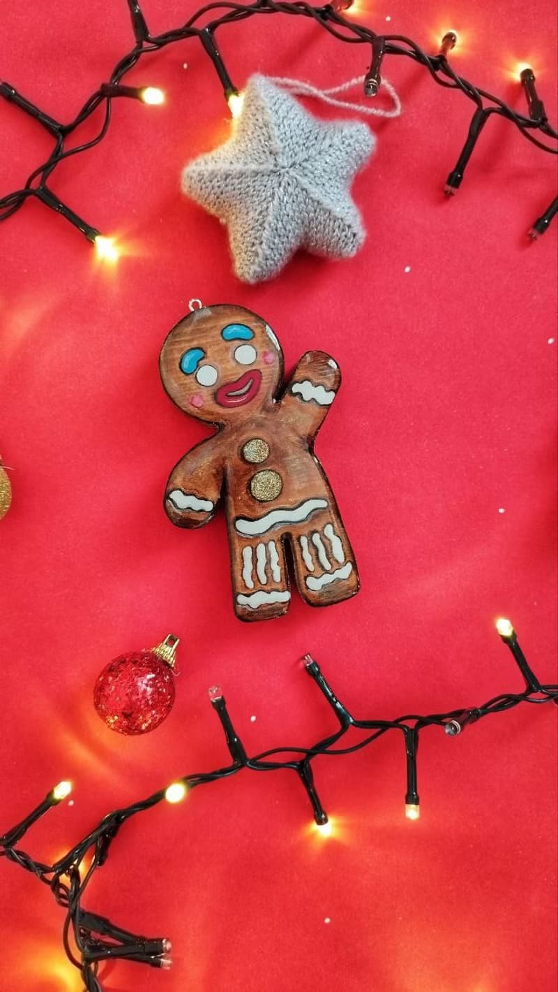 Gingerbread man, a Christmas tree toy made of wood.