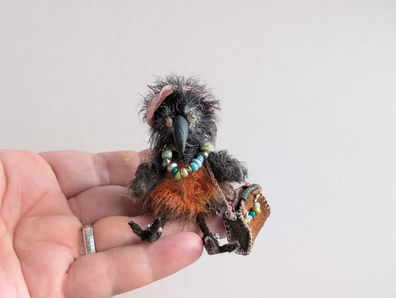 Fashionista Crow. This beauty is crocheted.