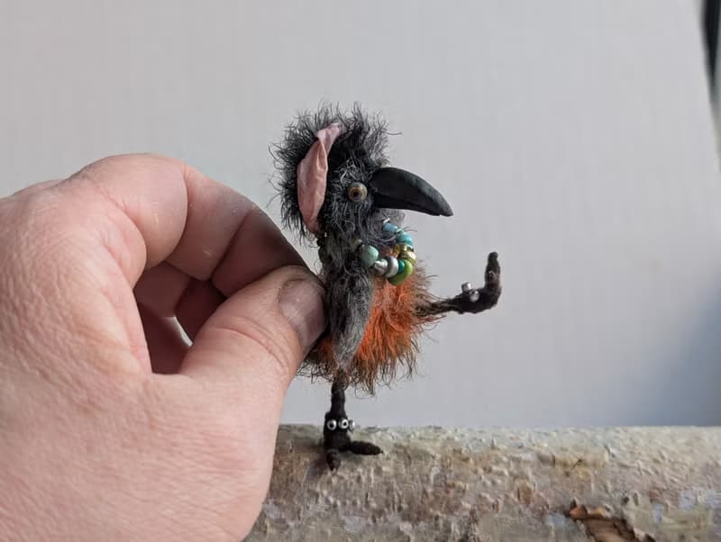 Fashionista Crow. This beauty is crocheted.