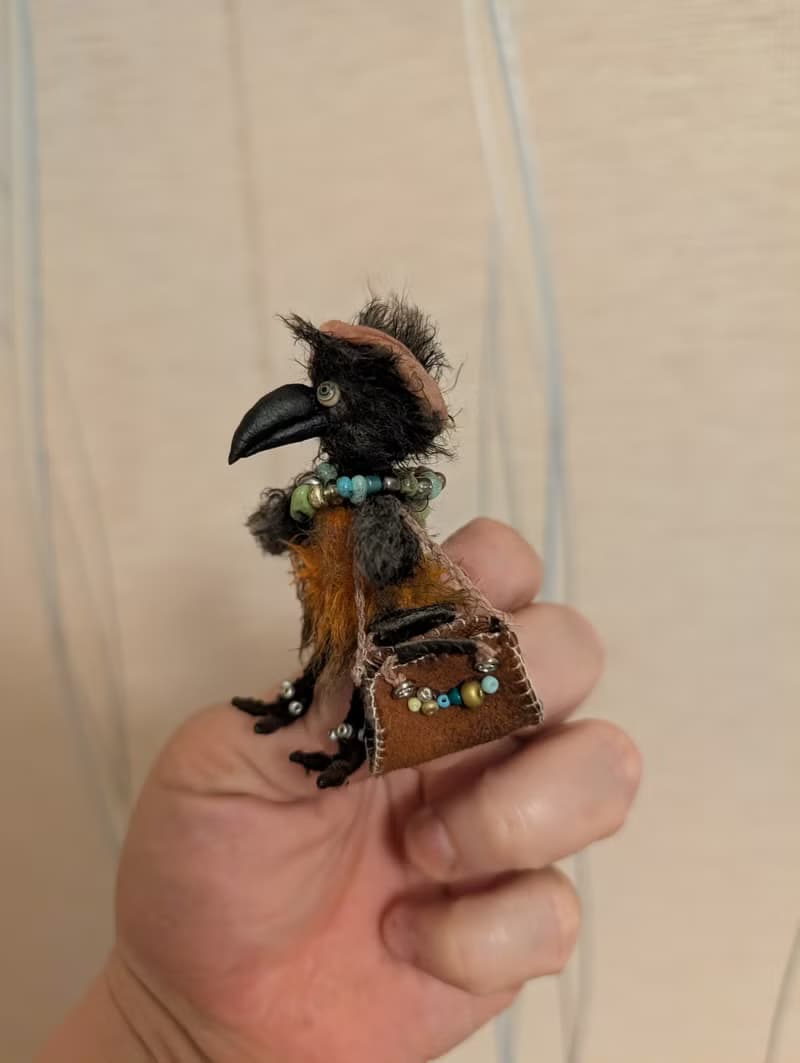 Fashionista Crow. This beauty is crocheted.