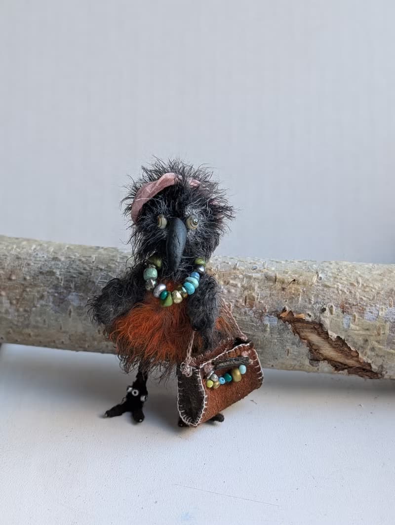 Fashionista Crow. This beauty is crocheted.