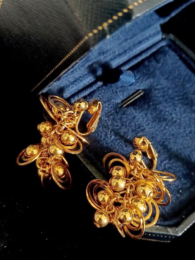 vintage jewelry  AVON 華麗金色星球環型吊飾 夾式耳環