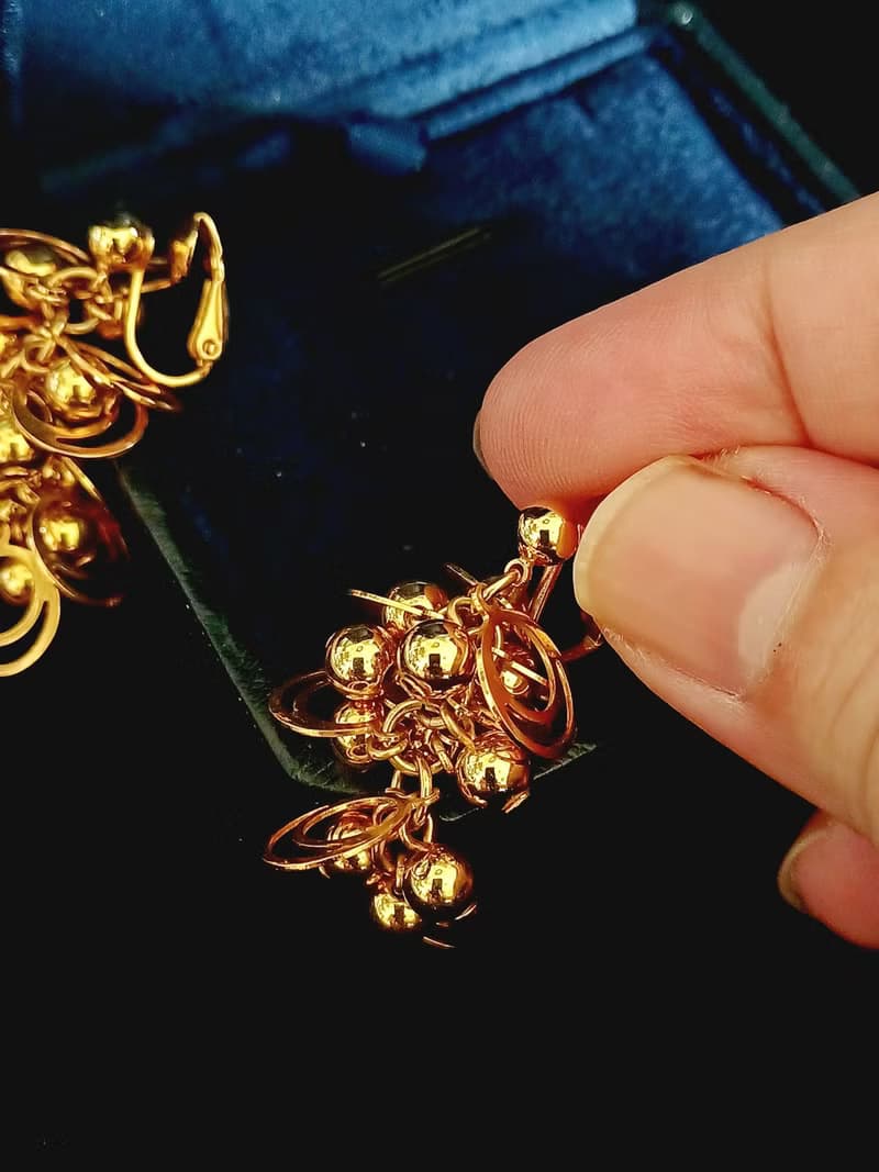 vintage jewelry  AVON 華麗金色星球環型吊飾 夾式耳環