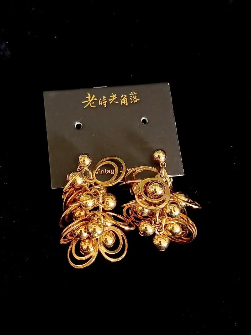 vintage jewelry  AVON 華麗金色星球環型吊飾 夾式耳環