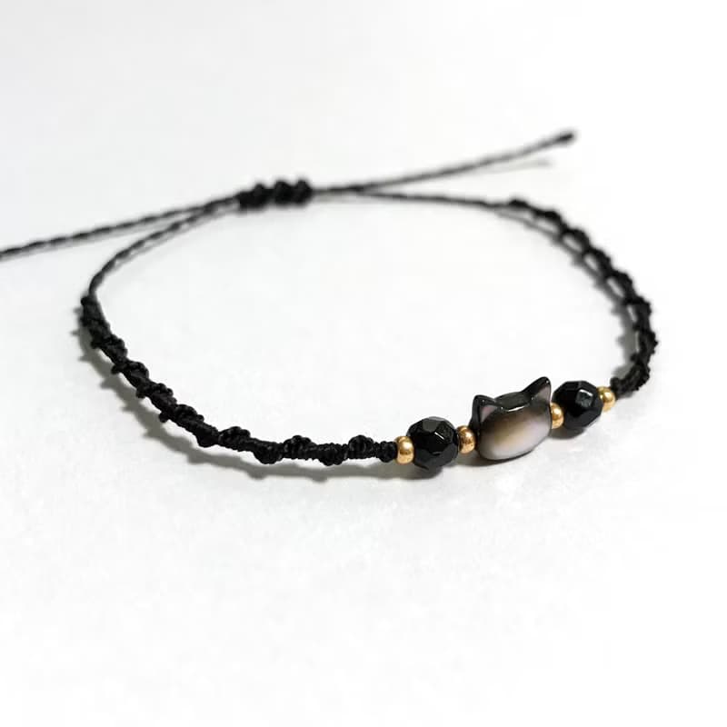 Black Cat mother-of-pearl, Onyx macrame knot bracelet