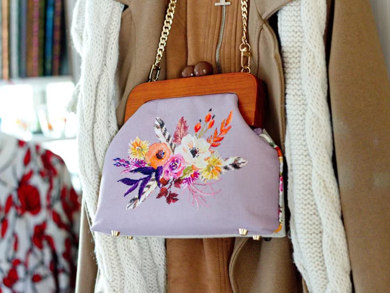 Handmade shoulder bag with cross stitched Boho bouquet, wooden clasp, crossbody
