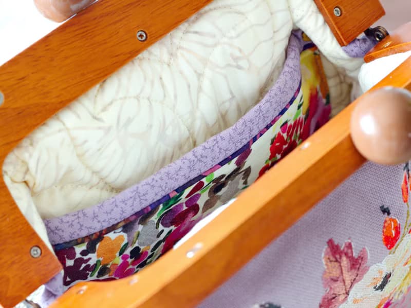 Handmade shoulder bag with cross stitched Boho bouquet, wooden clasp, crossbody