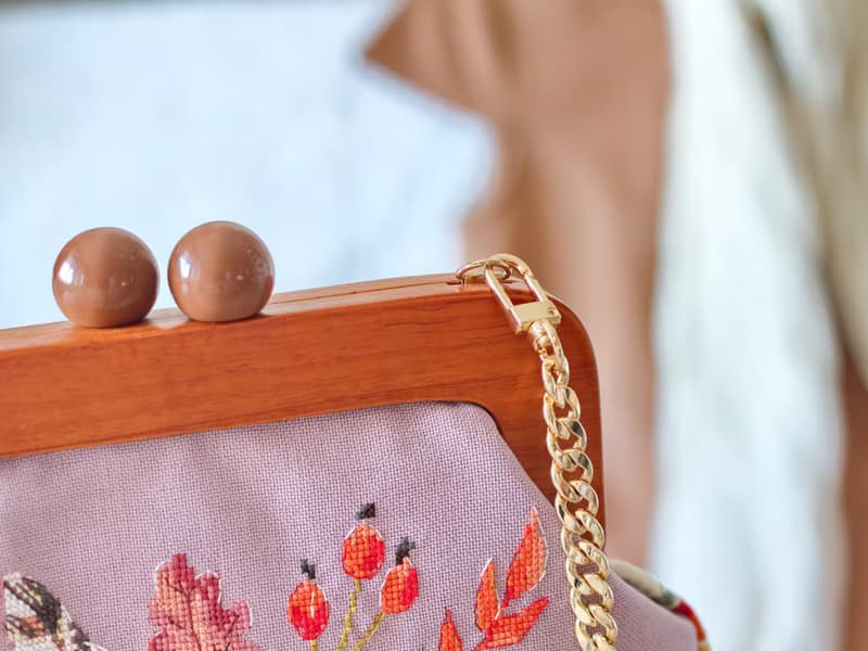 Handmade shoulder bag with cross stitched Boho bouquet, wooden clasp, crossbody