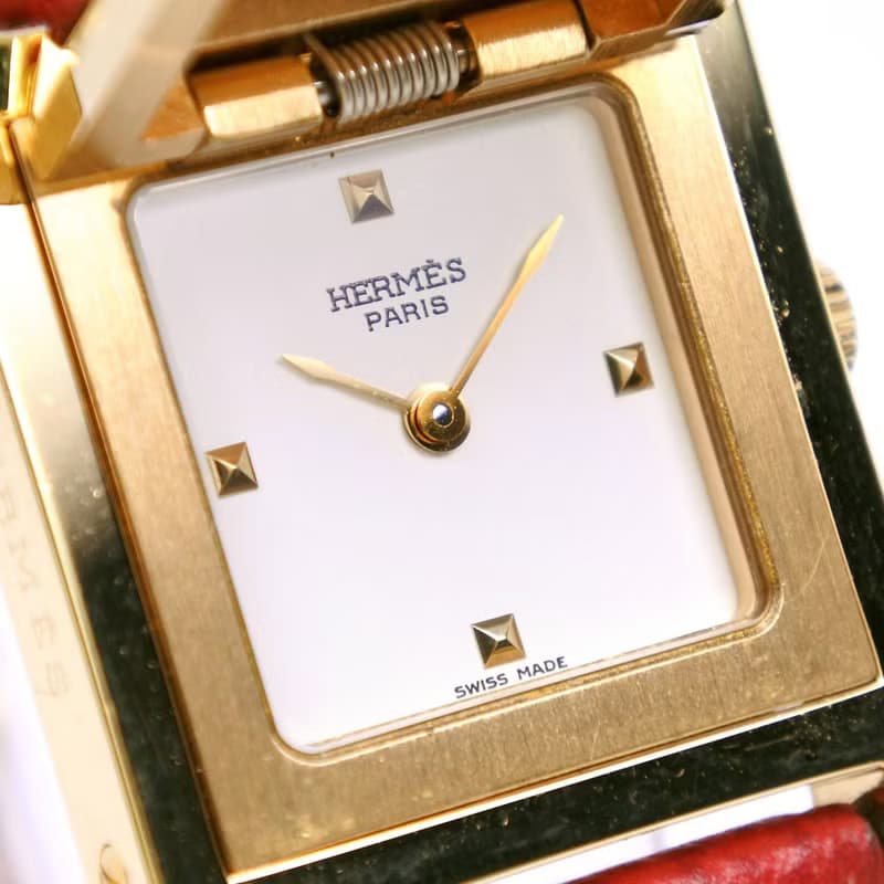 【日本直送】エルメス HERMES メドール 腕時計 金メッキ × レザー 赤/ゴールド  クオーツ 白文字盤 レディース【中古】