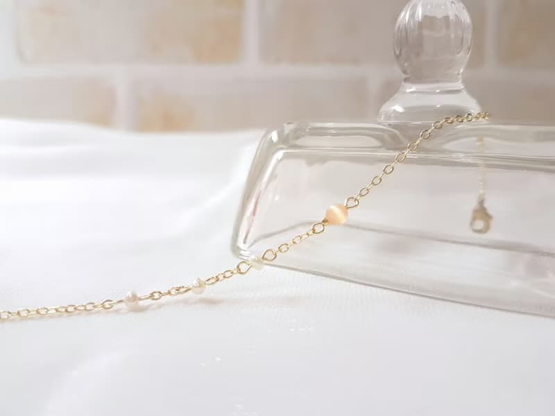 蜜柑 ‧ 珍珠 貓眼石 細手鍊