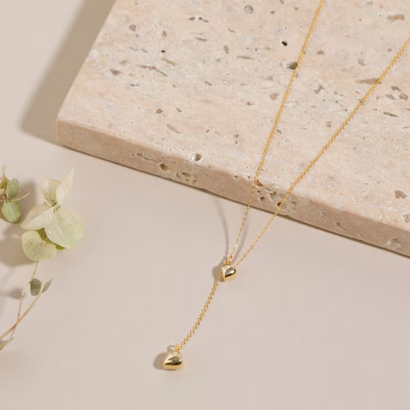 pendulum-heart necklace GD ニッケルフリー スムースラリエットネックレス 長さが自由に変えられるハートのロングネックレス　ゴールド