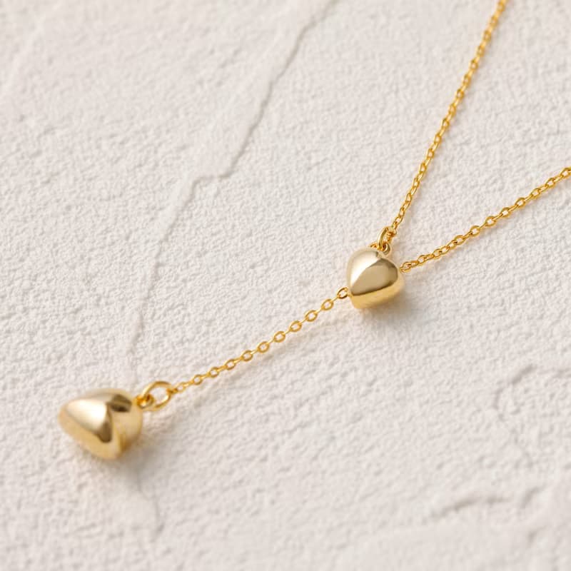 pendulum-heart necklace GD ニッケルフリー スムースラリエットネックレス 長さが自由に変えられるハートのロングネックレス　ゴールド