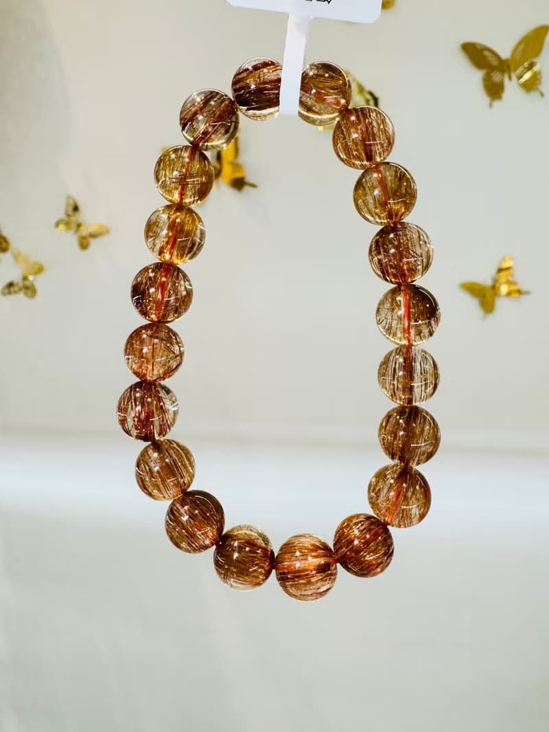 天然玻璃透體閃亮銅鈦水晶10mm25.28g正財事業正能量避邪