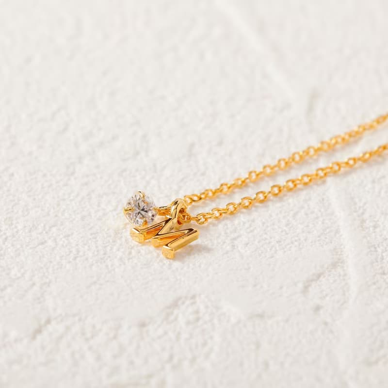 petit-initial necklace 【M】 ニッケルフリーネックレス 　小さなイニシャルをかたどったペンダントネックレス