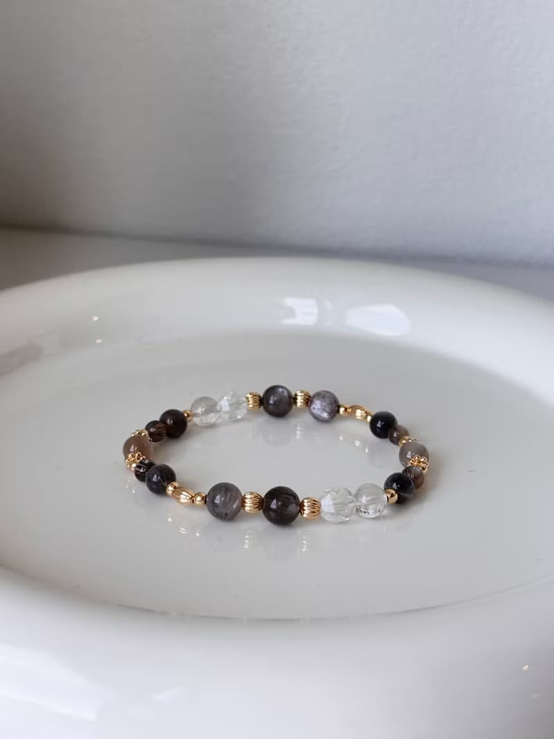 /餘燼/ 正能量 防小人 避邪 財運 星輝骨幹 黑金骨幹 白水晶 手鍊