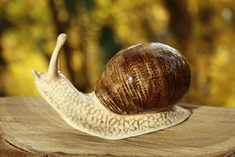 Snail porcelain figurine, statuette, statue