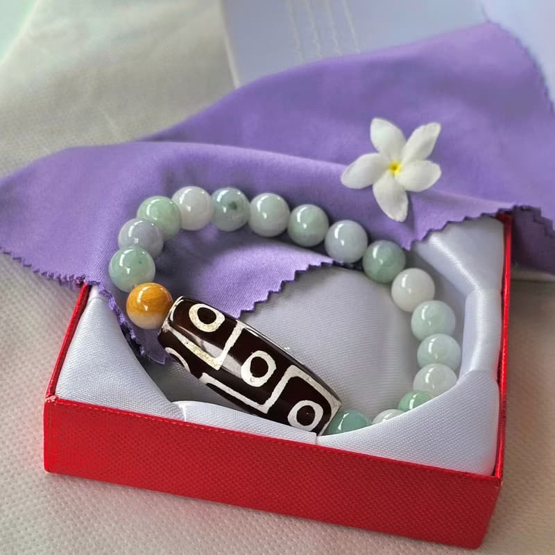 Bracelet, Tibetan Stone, 9 eyes, strung with Burmese jade, real jade, natural jade, Type A, 9.5 mm beads.