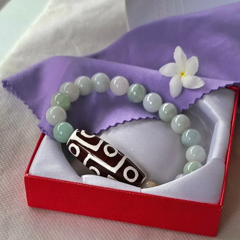 Bracelet, Tibetan Stone, 9 eyes, strung with Burmese jade, real jade, natural jade, Type A, 9.5 mm beads.