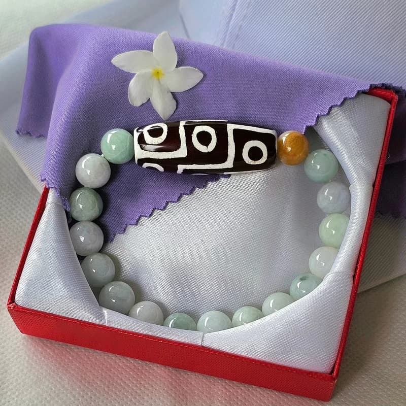 Bracelet, Tibetan Stone, 9 eyes, strung with Burmese jade, real jade, natural jade, Type A, 9.5 mm beads.