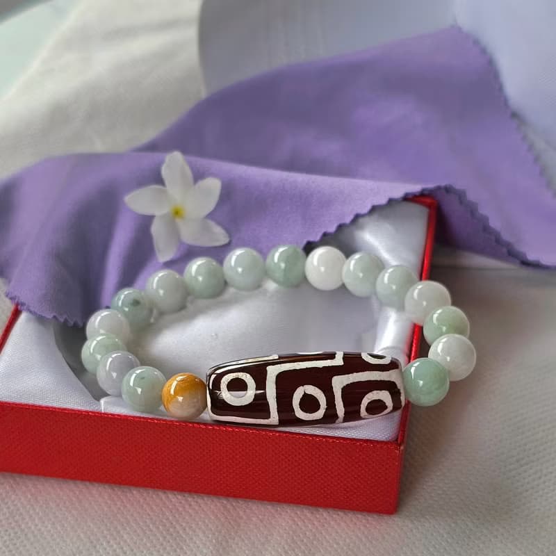 Bracelet, Tibetan Stone, 9 eyes, strung with Burmese jade, real jade, natural jade, Type A, 9.5 mm beads.