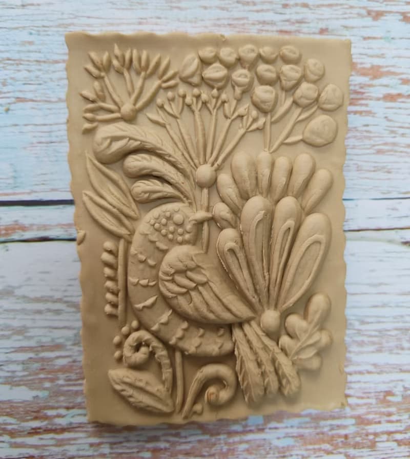 A small rolling pin for cookies,drawing a bird
