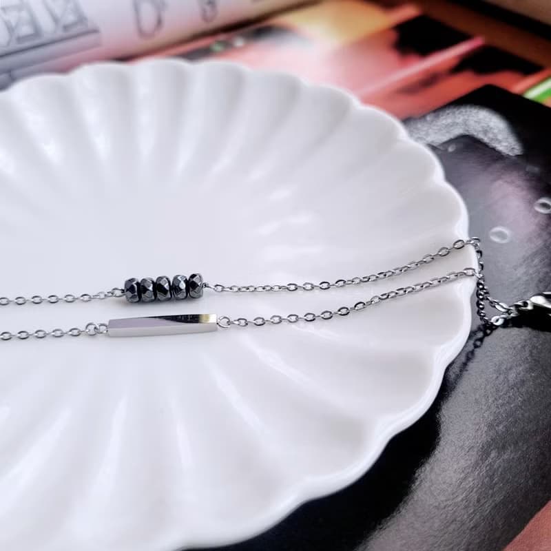 深夜邂逅。黑膽石簡約直條造型白鋼手鍊