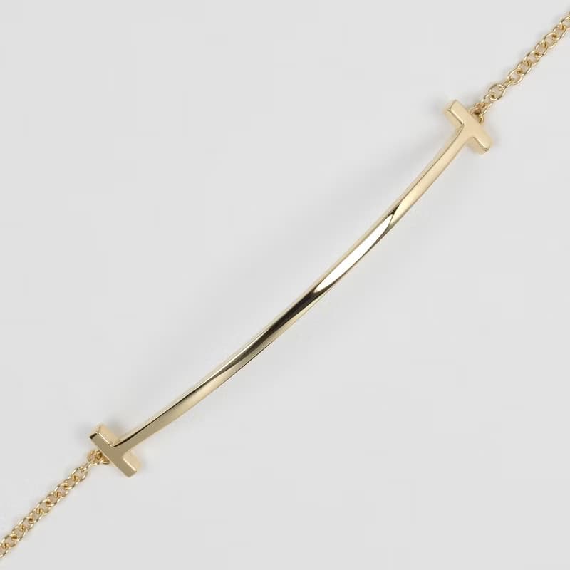 【日本直送】ティファニー ブレスレット Tスマイル 腕周り18.5cm K18YG イエローゴールド 約2.85g TIFFANY&Co.【中古】Aランク