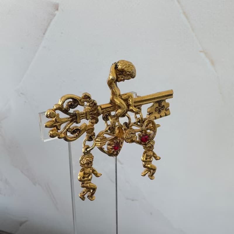 Vintage ART Signed Brooch Gold Tone Key with Angel Cherub Cupid Hearts Ruby pin