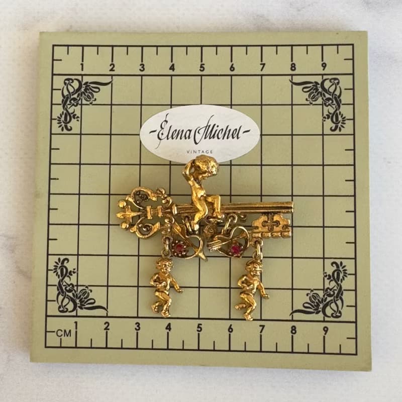 Vintage ART Signed Brooch Gold Tone Key with Angel Cherub Cupid Hearts Ruby pin