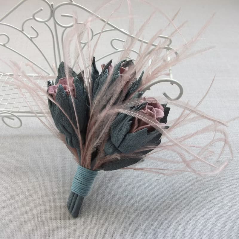 Leather brooch with a bouquet of roses and ostrich feathers