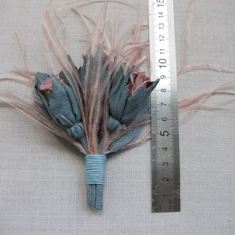 Leather brooch with a bouquet of roses and ostrich feathers