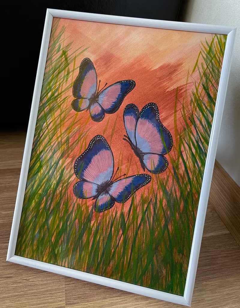 Cheerful dancing butterflies in green grass. Watercolor.