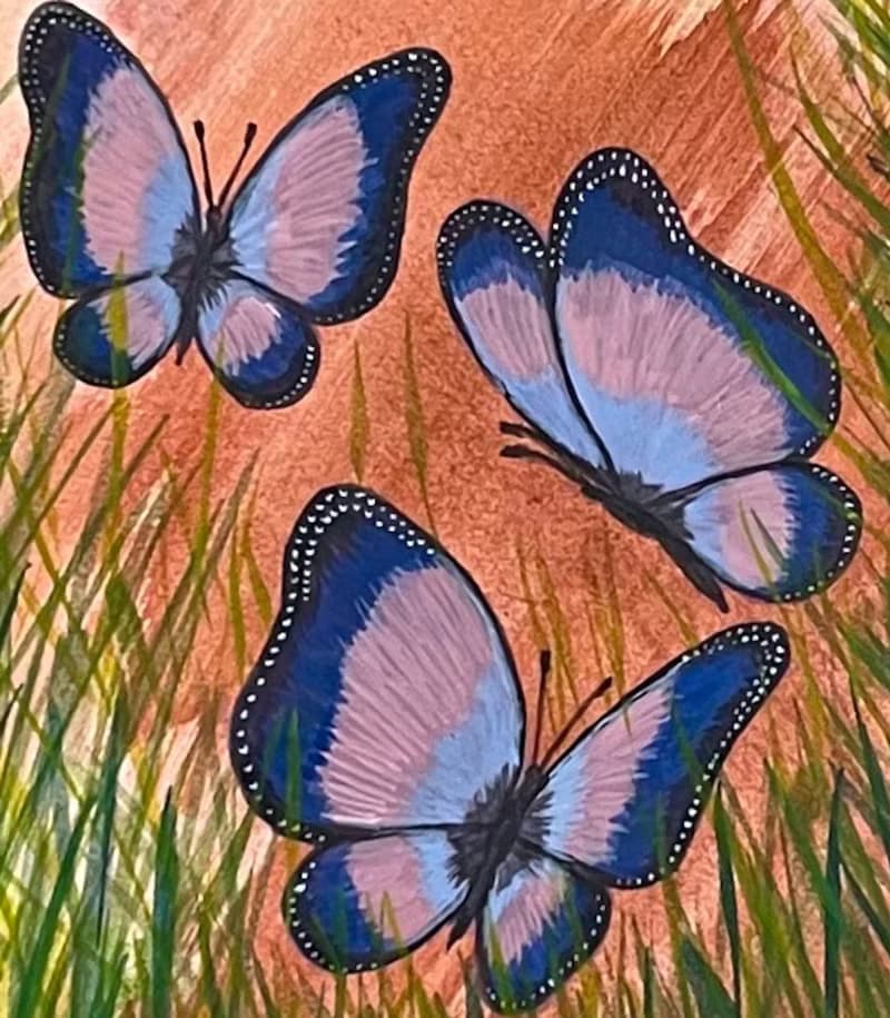 Cheerful dancing butterflies in green grass. Watercolor.