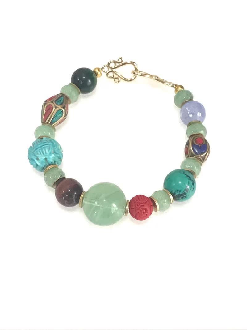 Cross culture stone bracelet
