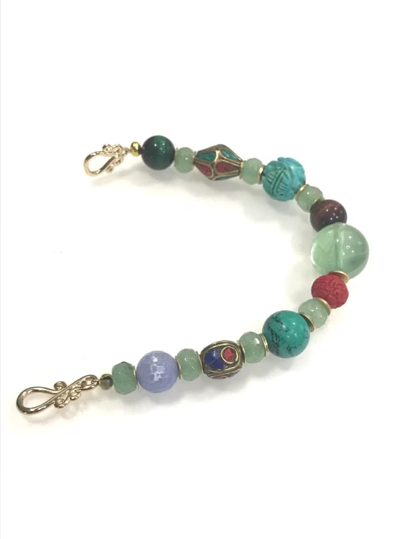 Cross culture stone bracelet