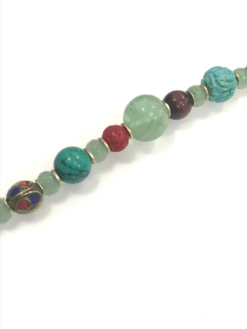 Cross culture stone bracelet