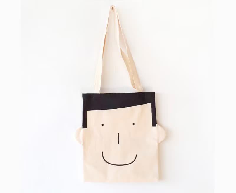 Fun tote bag with smiling face made of 100% cotton fabric