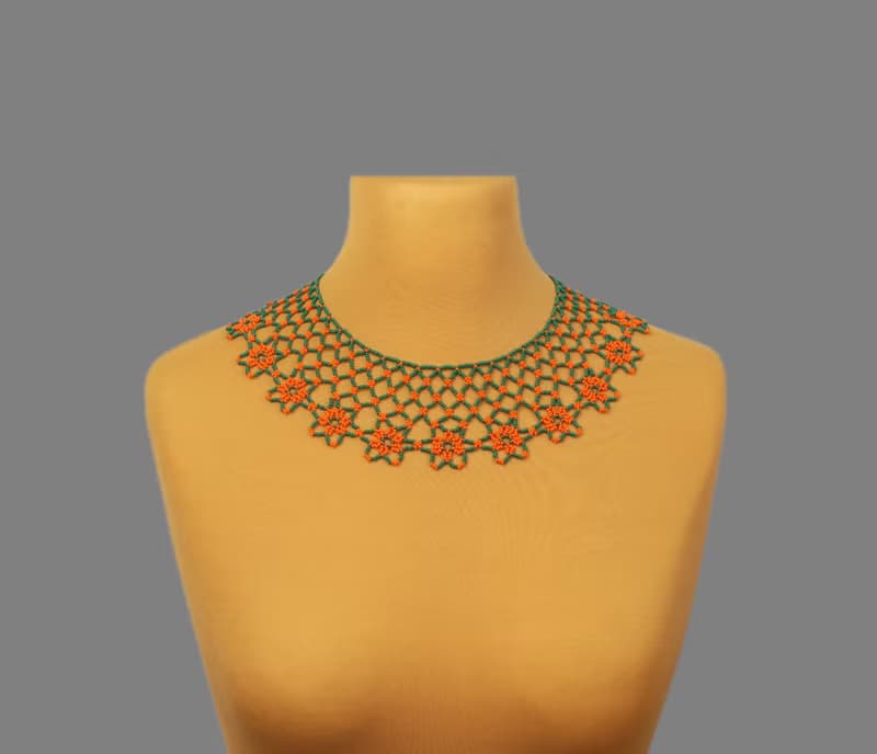 Green necklace with orange flower