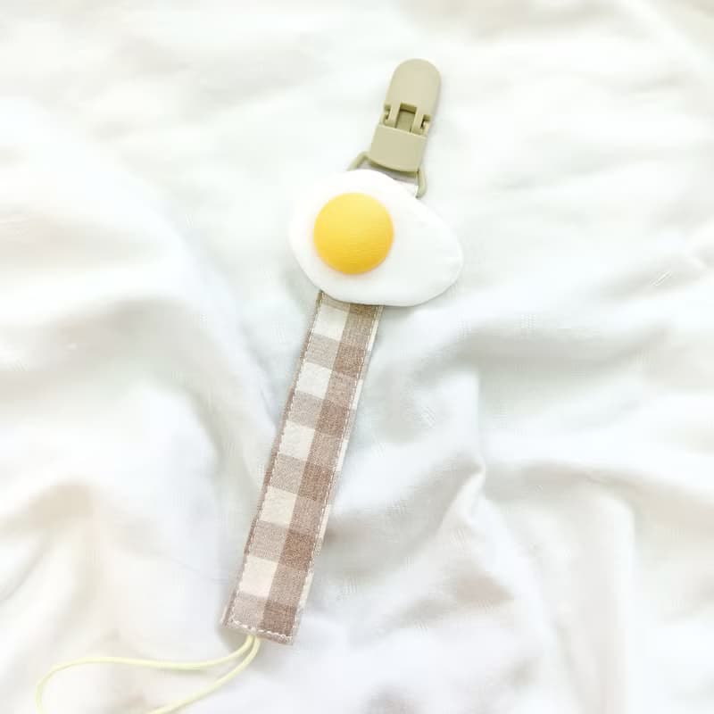 任性的荷包蛋-4款可選。立體蛋黃奶嘴鏈