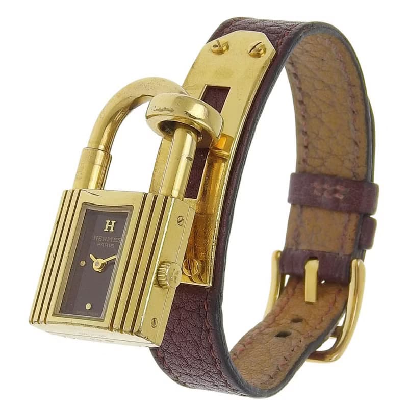【日本直送】エルメス HERMES ケリーウォッチ 腕時計 金メッキ×レザー クオーツ アナログ表示 ワインレッド文字盤 レディース【中古】