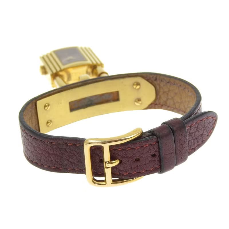 【日本直送】エルメス HERMES ケリーウォッチ 腕時計 金メッキ×レザー クオーツ アナログ表示 ワインレッド文字盤 レディース【中古】