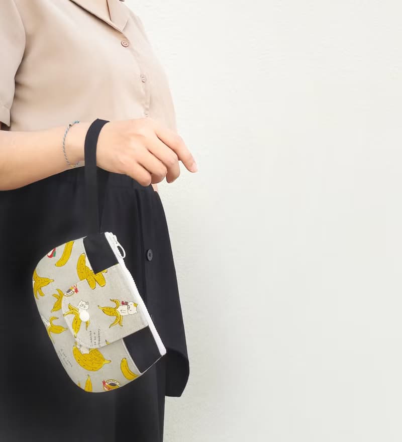 詼諧香蕉貓 百寶袋/手拿包/防疫包/零錢包