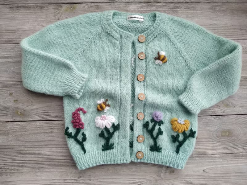 Handmade alpaca wool sweater, jacket with embroidered flower. Childrens clothing