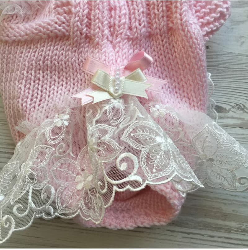Hand knit pink romper with ivory lace, hat and shoes for baby girl.