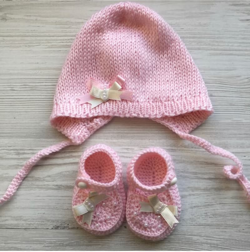 Hand knit pink romper with ivory lace, hat and shoes for baby girl.